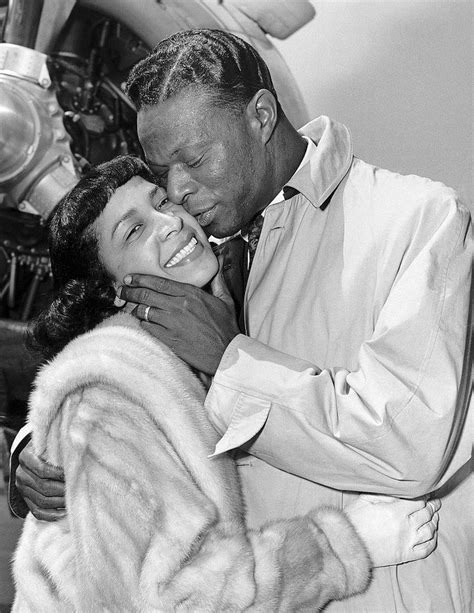 Nat King Cole And His Wife Maria Share A Tender Moment Together In