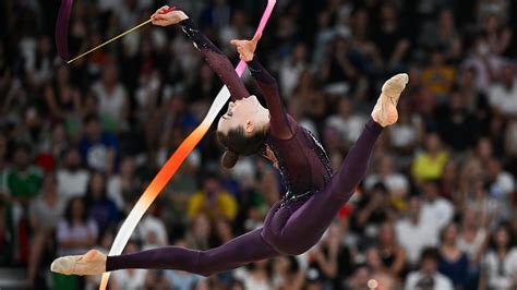 Flip Through How Artistic And Rhythmic Gymnastics Differ At The