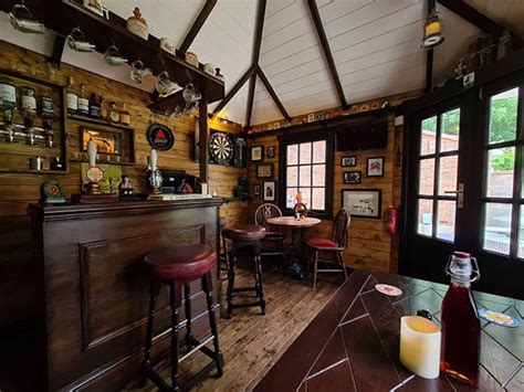 This Family's Tiny Garden Pub Looks Just Like a Real Bar Inside