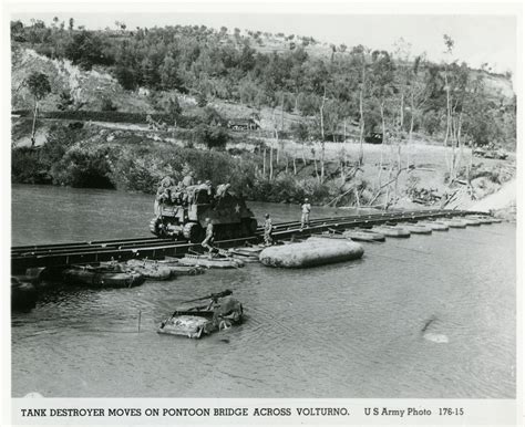 US Army tank destroyer being transported across the Volturno River ...