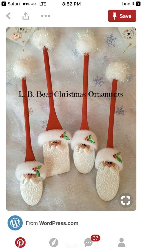 Four Red And White Christmas Ornaments With Santa Clause On Them