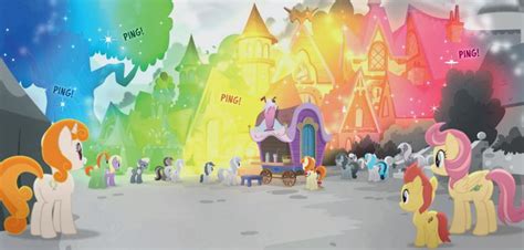 many different colored ponies are standing in front of a castle with ...