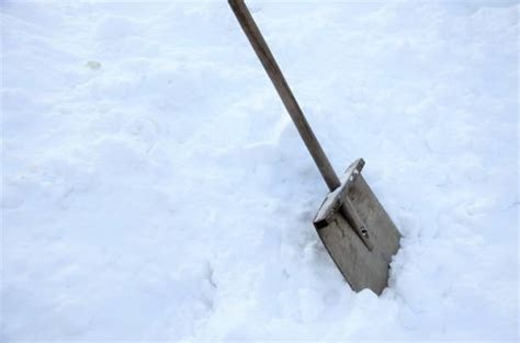 Shoveling Snow Neighbor Stock Photos Pictures And Royalty Free Images