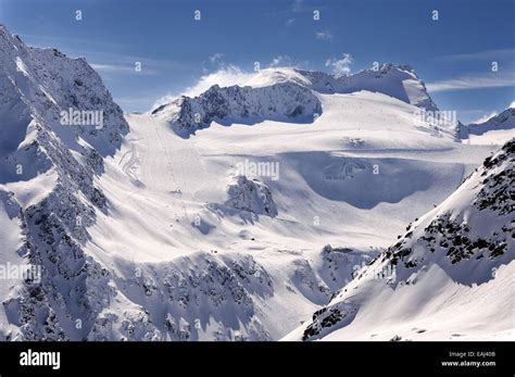 Ski pistes and lifts on Glacier in Solden ski resort in Otztal Alps in ...