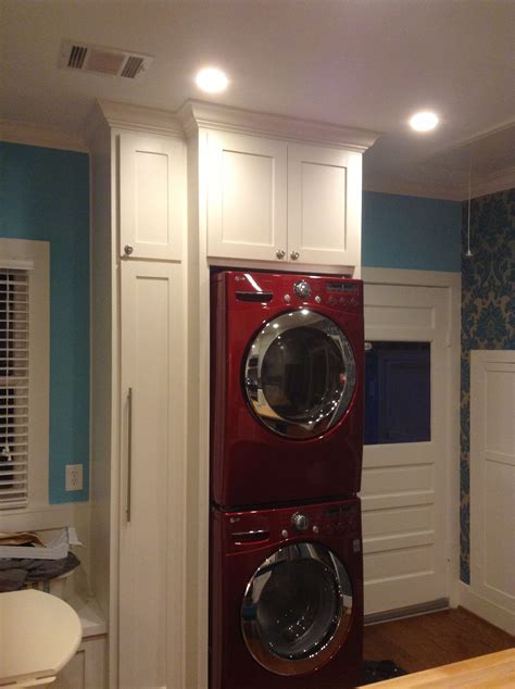 Red Lg Stacked Washerdryer Laundry Area In Kitchen Crown Molding