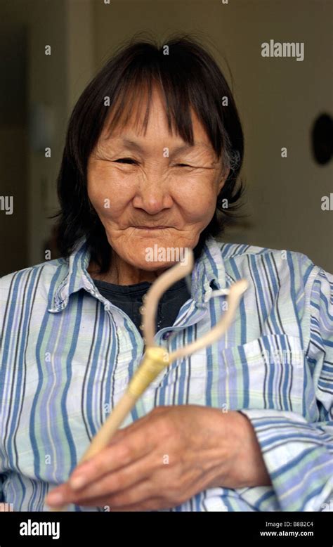 Inuit Woman Showing Her Carving Cambridge Bay Nunavut Stock Photo Alamy