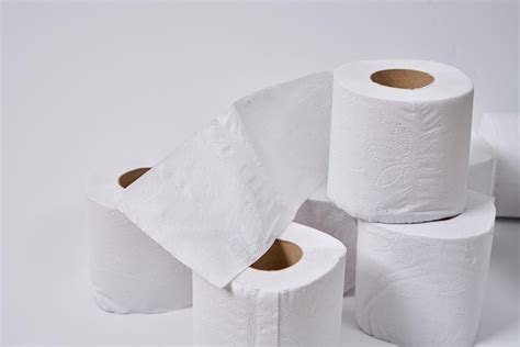 Premium Photo White And Hygienic Toilet Papers On A Clean Toilet Counter