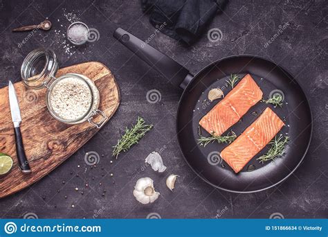 Fresh Fish Raw Salmon Preparation With Cooking Ingredients Stock Photo