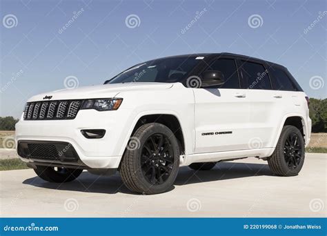 Jeep Grand Cherokee Display at a Chrysler Dealership. the Stellantis ...