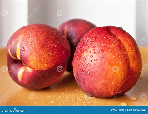 Fresh Wet Yellow Nectarines In A Plate Stock Photo Image Of