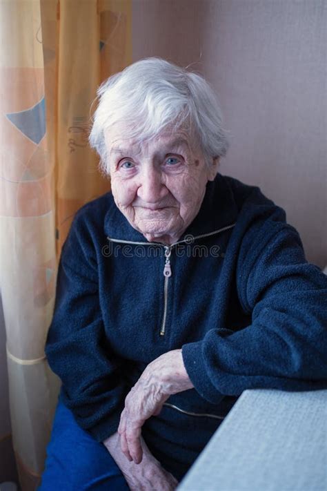 An Old Woman In Her House Black And White Photo Stock Photo Image