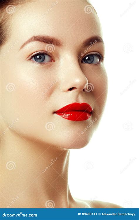 Beautiful Woman`s Purity Face With Bright Red Lip Makeup Stock Image