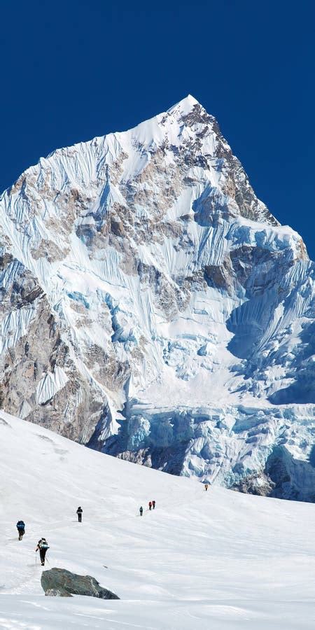 Mount Nuptse And Glacier With Hikers Stock Photo Image Of