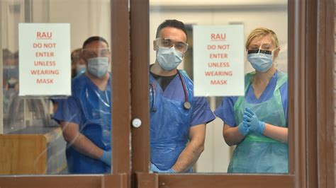 Coronavirus Protective Equipment Being Washed And Reused By Doctors As