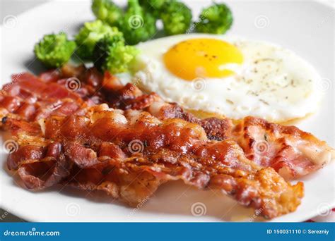 Fried Bacon Rashers And Egg On Plate Closeup Stock Photo Image Of