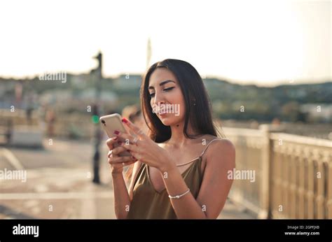 young indian woman smartphone   res stock photography  images