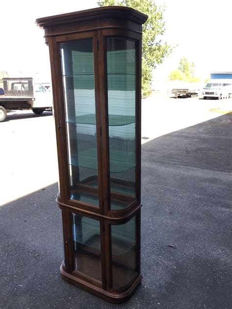 Pulaski Oak Lighted Curved Glass Curio Cabinet For Sale In Tumwater WA