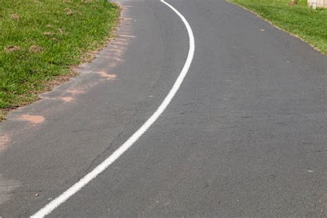 120+ Solid White Line On Asphalt Road Closeup Stock Photos, Pictures ...