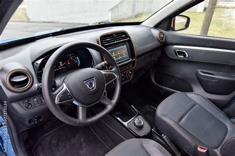 Dacia Spring. A small electric car in the city. Cabin interior - dashboard. 01-19-2022, Prague ...