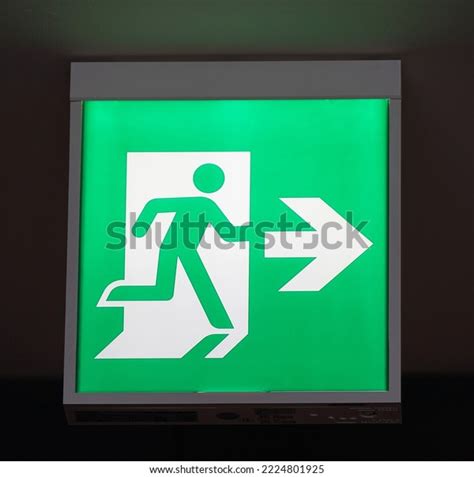 Glowing Green Emergency Exit Signs Indoors Stock Photo 2224801925 ...