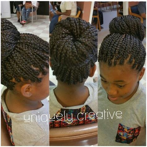 Box braids in a bun. | Box braids hairstyles, Box braids styling, Box ...