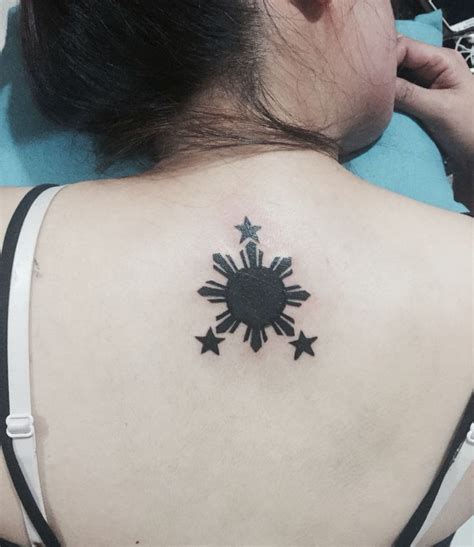 My 2nd ink.. 3 star and a sun.. Symbolizes the flag of Philippines ...