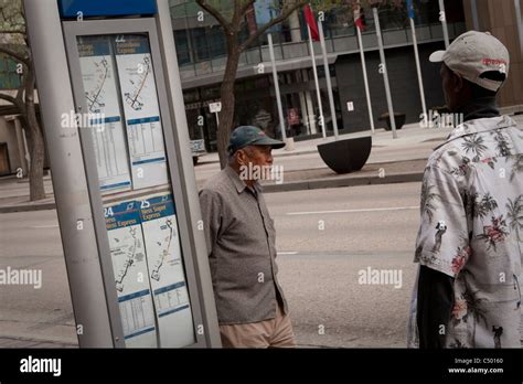 Winnipeg Transit Bus Routes Are Pictured At A Bus Stop In Winnipeg