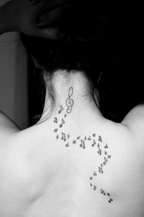 Back Neck Music Notes Tattoos For Girls