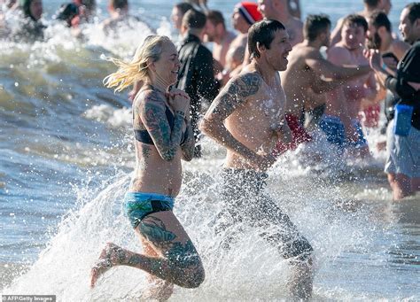 People All Over The World Participate In Polar Bear Plunges Across The