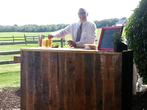 Outdoor bar with an arbor-covered seating area. Perfect for summer and ...