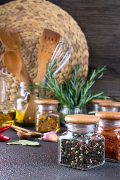 Premium Photo Kitchen Utensils Herbs Colorful Dry Spices In Glass