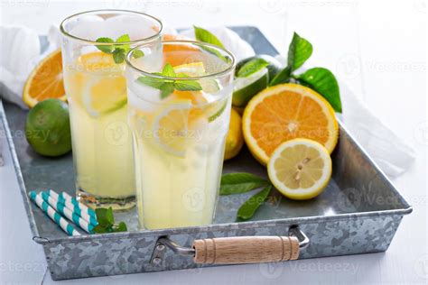 Citrus lemonade in tall glasses 15694932 Stock Photo at Vecteezy