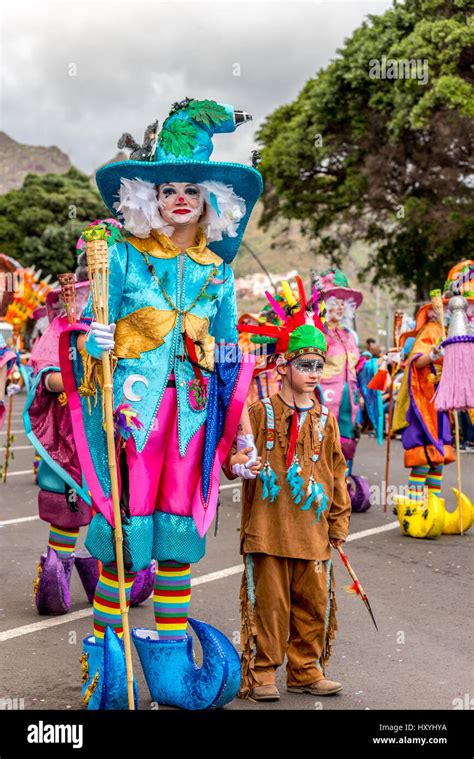 Woman and boy in very elaborate costumes in the Tenerife carnival ...