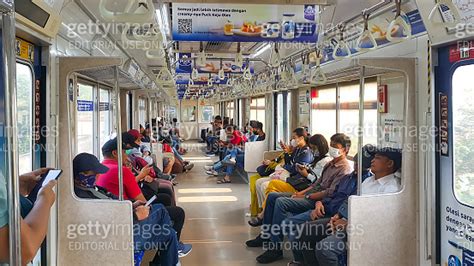 View Inside The Krl Commuter Line Train Carriage Passengers Sit In A