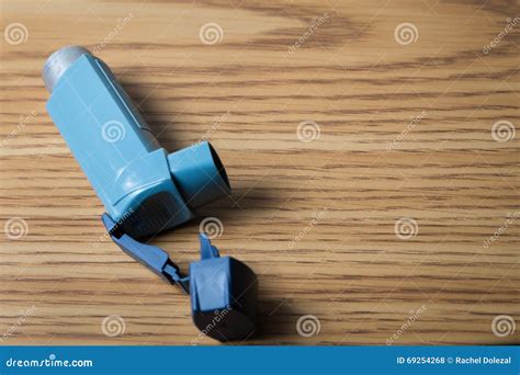 Blue Asthma Inhaler Medication Isolated On White Background Stock