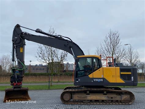 Volvo EC 220 EL ROTOTILT OILQUICK BUCKET AIRCO Tracked