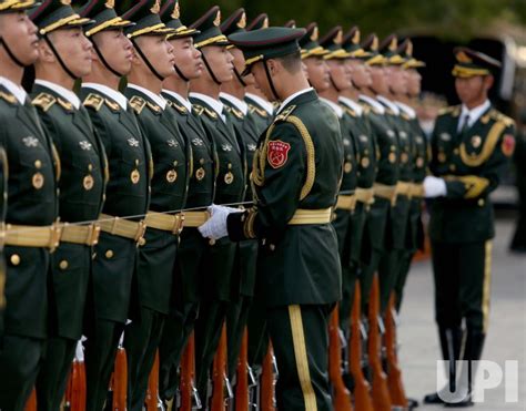 Photo: Chinese soldiers prepare to perform military honor guard duties in Beijing, China ...