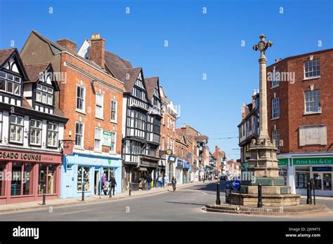 Tewkesbury Town centre shops and the Tewkesbury War Memorial (The Cross ...