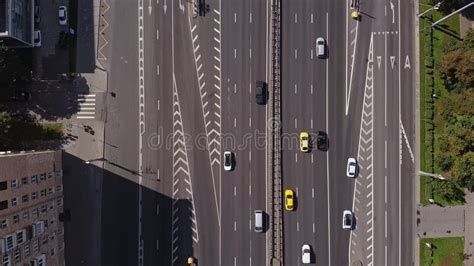 Aerial View Of A Busy Intersection Where Cars Turn Sour Stock Footage