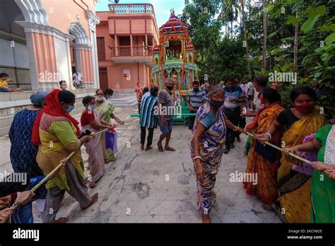 People Dragging The Chariot Of Lord Jaganath By Pulling The Ropes Of