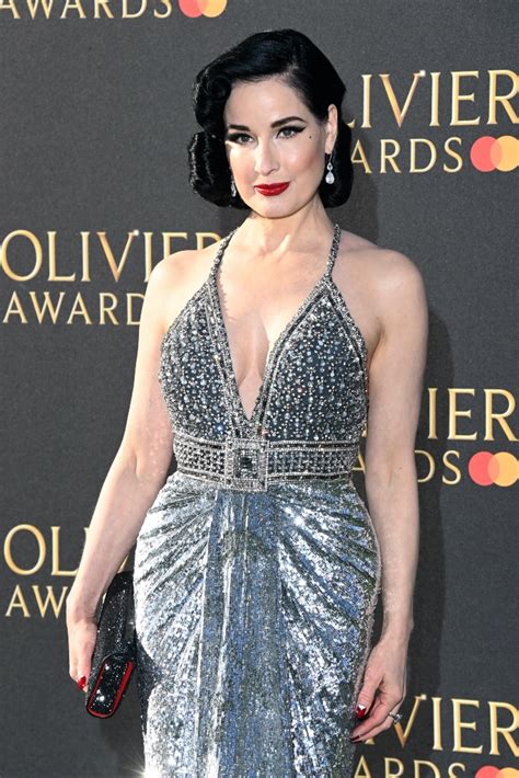 Dita Von Teese Shines In Plunging Silver Dress At Olivier Awards 2023