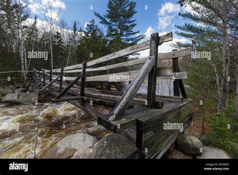 Side view of the Thoreau Falls Trail bridge, which crosses the East ...