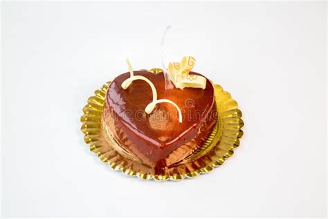 Heart Shaped Cake On A Gold Tray On White Background Stock Image