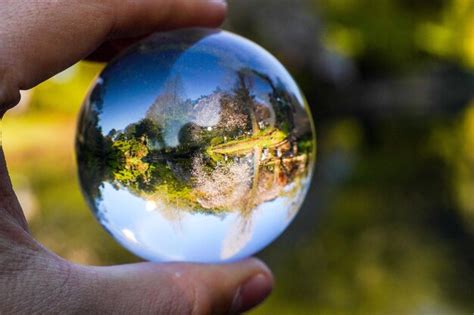 Premium Photo Cropped Image Of Person Holding Crystal Ball