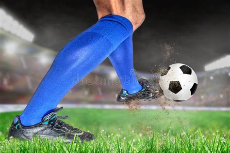 Soccer Player Kicking Football in Outdoor Stadium with Copy Space Stock ...