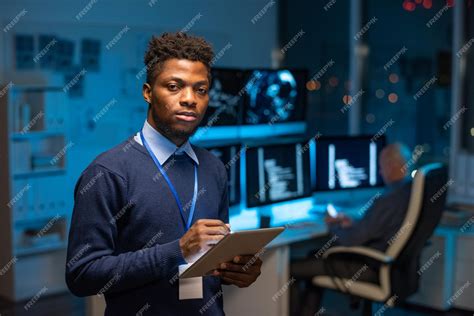 Premium Photo Young Serious African Programmer With Tablet