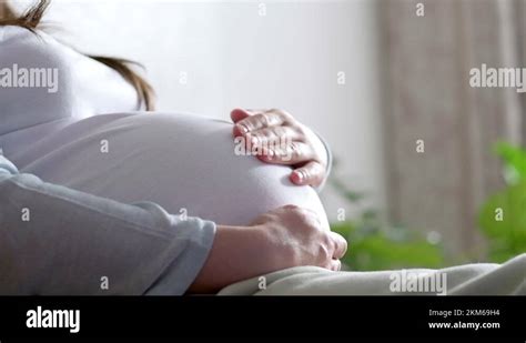 4k Side View Pregnant Expectant Mother Caressing Her Belly Woman Hands