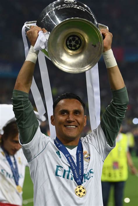 Real Madrid S Costa Rican Goalkeeper Keylor Navas Holds The Trophy As