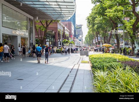 Singapore Pedestrians In Orchard Road Street Scene Stock Photo Alamy