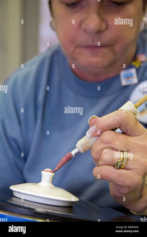 Artist Paints Design On Sugar Bowl Stock Photo Alamy